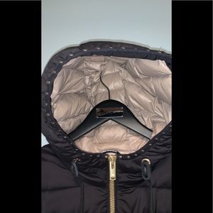 Women’s large moose knuckles marquee hooded black coat.